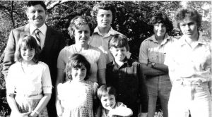 Frank and Julie Ryan and their family in 1976, with daughter Lucy in front of her Dad. Picture: Ryan family album