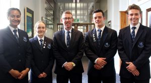 Headmaster Pat Drummk with the 2018 head and deputy prefects