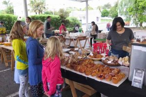 Family shopping at the Mt Albert market