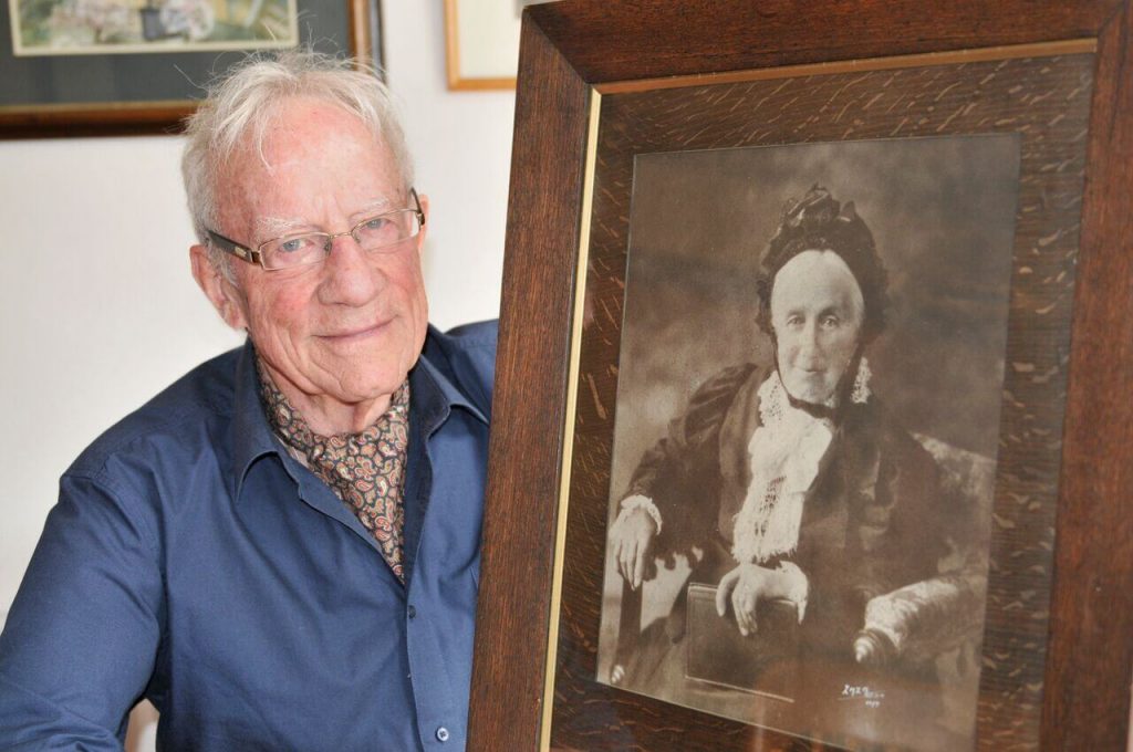 Sir Harold Marshall with a photograph of his great-grandmother, Sarah Woodward