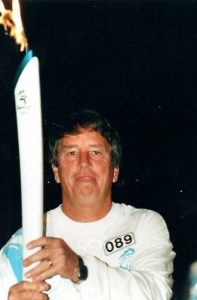 Terry Maddaford with the Olympic torch