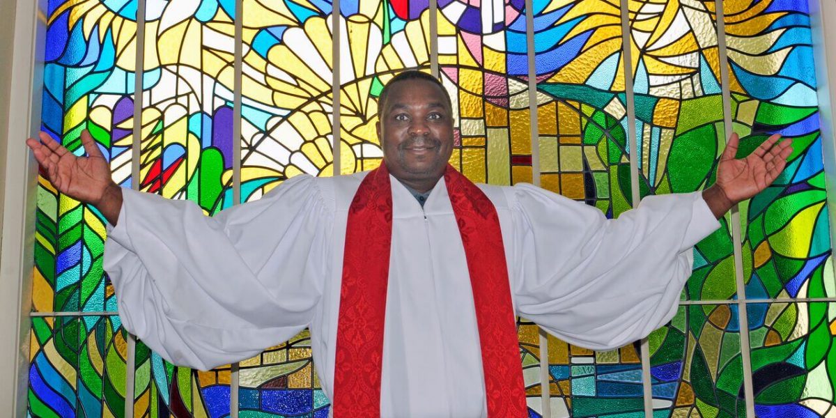 Amos Muzondiwa was once a beer brewer. Now he's pastor of Mt Albert's Methodist Church. Picture: Julia Thorne